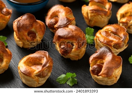 Mini Toad in the hole, Baked sausages in Yorkshire pudding with gravy
