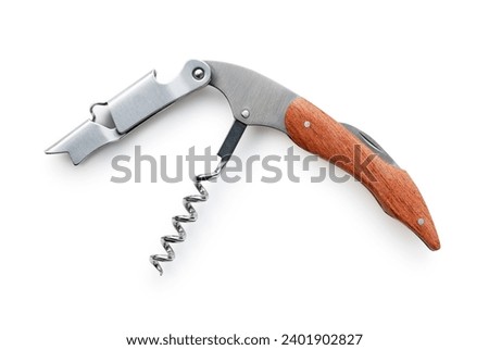 Sommelier knife placed on white background. Wooden handle. View from above. Royalty-Free Stock Photo #2401902827