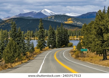 Mt. Blue Sky Scenic Byway - An Autumn day view of Mt. Blue Sky Scenic Byway at Echo Lake, with snow-capped Mt. Blue Sky towering in background. CO, US Royalty-Free Stock Photo #2401917513