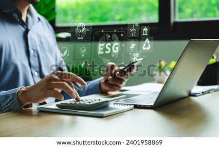 ESG environment social governance investment concept. Businessman using computer to analyze investment ESG. strategy that considers the environmental, company carbon labor practices, sustainability