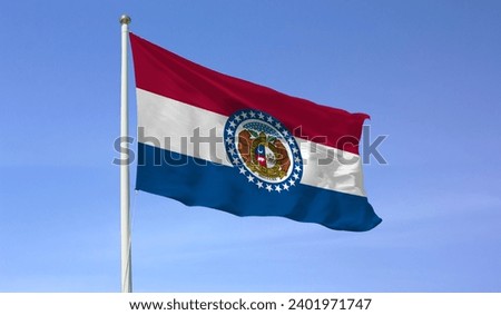 Flag of Missouri (U.S.) waving beautifully in the sky. The symbol of the Missouri state on wavy fabric