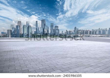Empty brick floor and skyline of Chongqing city center in China Royalty-Free Stock Photo #2401986105