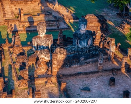 Wat Phra Kaeo at Kamphaeng Phet Historical Park in Thailand Royalty-Free Stock Photo #2402007297