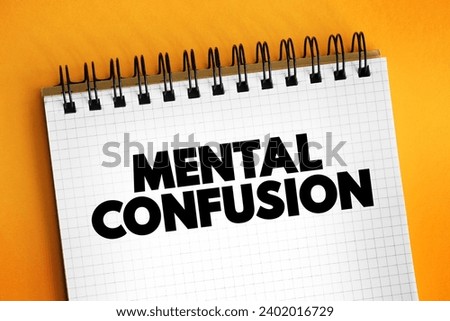 Mental Confusion is the inability to think as clearly or quickly as you normally do, text concept for presentations and reports Royalty-Free Stock Photo #2402016729