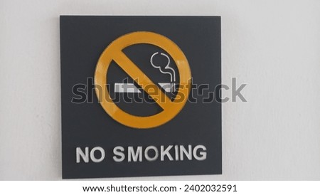 A "No Smoking" sign is a sign prohibiting smoking in public places.