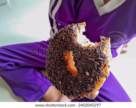 A donut that has been eaten