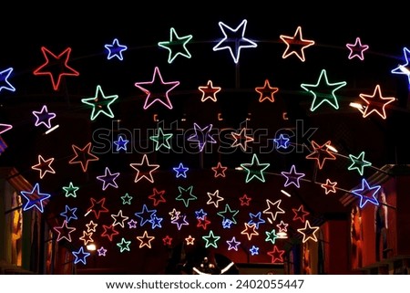 street christmas (Xmas) decoration with stars with black background