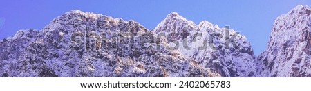 View of Alps in Kranjska Gora at sunrise. The tops of the mountains are covered with snow. Triglav national park. Slovenia, Europe Horizontal banner