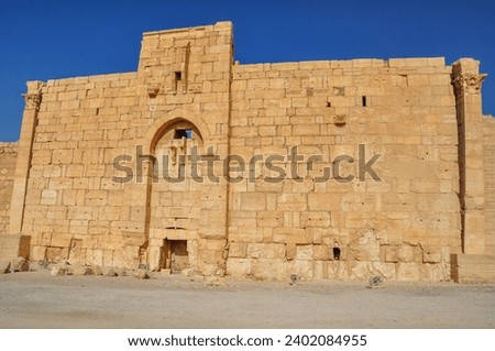 The Bel Temple in Palmyra, Syria, is an ancient architectural marvel. Majestic columns and intricate carvings adorn its facade, reflecting a blend of Roman and Semitic influences. The temple, dedicate Royalty-Free Stock Photo #2402084955