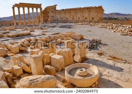 The Bel Temple in Palmyra, Syria, is an ancient architectural marvel. Majestic columns and intricate carvings adorn its facade, reflecting a blend of Roman and Semitic influences. The temple, dedicate Royalty-Free Stock Photo #2402084975