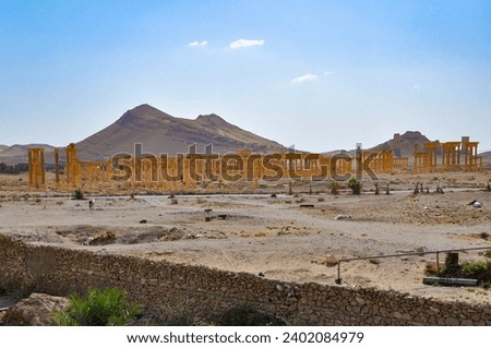 The Bel Temple in Palmyra, Syria, is an ancient architectural marvel. Majestic columns and intricate carvings adorn its facade, reflecting a blend of Roman and Semitic influences. The temple, dedicate Royalty-Free Stock Photo #2402084979