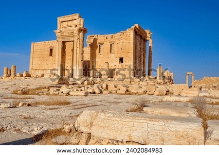 The Bel Temple in Palmyra, Syria, is an ancient architectural marvel. Majestic columns and intricate carvings adorn its facade, reflecting a blend of Roman and Semitic influences. The temple, dedicate Royalty-Free Stock Photo #2402084983
