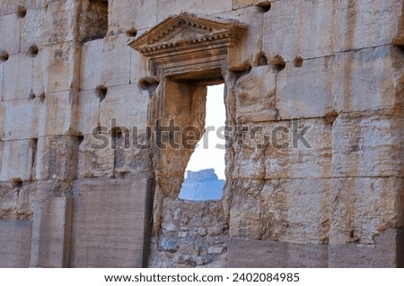 The Bel Temple in Palmyra, Syria, is an ancient architectural marvel. Majestic columns and intricate carvings adorn its facade, reflecting a blend of Roman and Semitic influences. The temple, dedicate Royalty-Free Stock Photo #2402084985