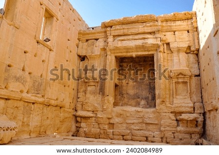 The Bel Temple in Palmyra, Syria, is an ancient architectural marvel. Majestic columns and intricate carvings adorn its facade, reflecting a blend of Roman and Semitic influences. The temple, dedicate Royalty-Free Stock Photo #2402084989