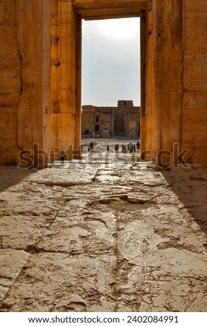 The Bel Temple in Palmyra, Syria, is an ancient architectural marvel. Majestic columns and intricate carvings adorn its facade, reflecting a blend of Roman and Semitic influences. The temple, dedicate Royalty-Free Stock Photo #2402084991