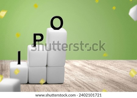 A stair of small cubes with IPO letters on a wooden table. Stock investment concept
