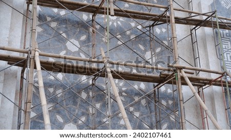 Combination of unique Bamboo scaffolding and iron scaffolding technique for renovation project
