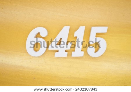 The golden yellow painted wood panel for the background, number 6415, is made from white painted wood.