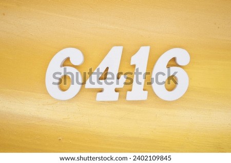 The golden yellow painted wood panel for the background, number 6416, is made from white painted wood.