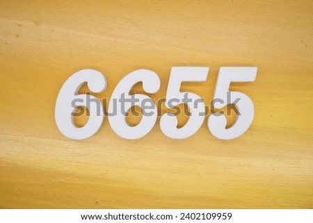 The golden yellow painted wood panel for the background, number 6655, is made from white painted wood.