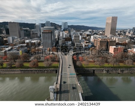 Aerial drone shot of the Morrison Bridge in Portland, Oregon in late November on a cloudy, overcast morning