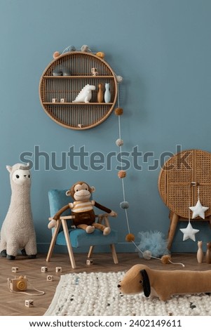 Interior design of warma nd cozy kid room interior with wooden shelf, blue wall, plush toys, lama, mouse, monkey, braided rug, green shelf and. personal accessories. Home decor. Template. 