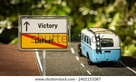 Street Sign the Direction Way to Victory versus Defeat