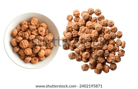 Tiger nuts. Tasty chufa nuts. Healthy superfood isolated on white background. bowl 