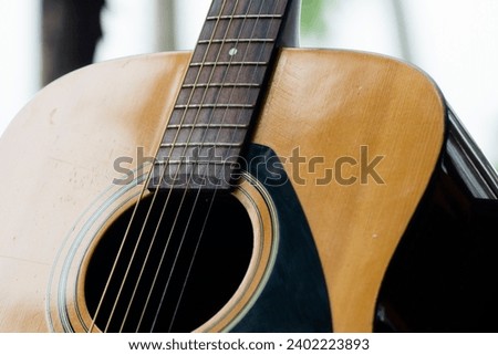 Acoustic guitar body. perfect for music festival poster background