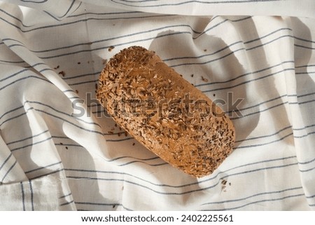 cereal bread on a striped tablecloth