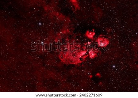 Red cosmic nebula in deep space. Elements of this image furnished by NASA. High quality photo