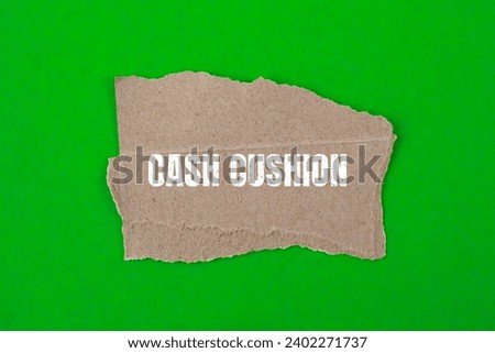Cash cushion lettering on ripped paper. Business concept photo.