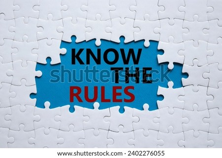 Know the rules symbol. Concept words Know the rules on white puzzle. Beautiful blue background. Business and Know the rules concept. Copy space.