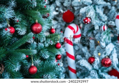 Merry x-mas,Close up of Colorful balls ,gifts box and Christmas greeting picture parcel,bell decoration on Green Christmas tree background Decoration During Christmas and New Year.