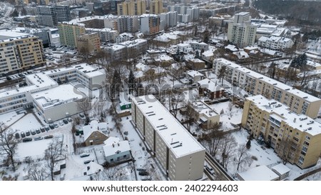 Drone photography of multistory houses in a city during winter day