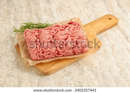 Raw beef minced meat for cooking over board