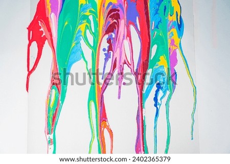 
Sweet tones flowing and blending together on the white floor. 
It is a strange abstract picture.
fantasy image of dripping paint on white background.
colorful of pantone color background. 
