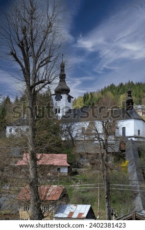 Church of the Transfiguration of the Lord in Spania dolina village. Slovakia. Royalty-Free Stock Photo #2402381423