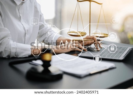 AML Anti Money Laundering Financial Bank Business Concept. judge in a courtroom using laptop and tablet with AML anti money laundering icon on virtual  screen. 
 Royalty-Free Stock Photo #2402405971
