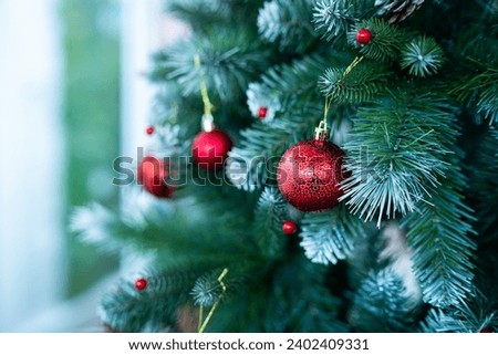 Merry x-mas,Close up of Colorful balls ,gifts box and Christmas greeting picture parcel,bell decoration on Green Christmas tree background Decoration During Christmas and New Year.