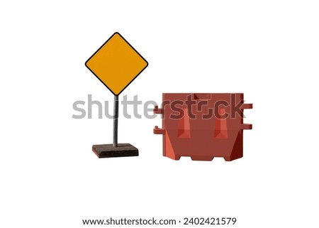 Blank road signs and plastic road barriers isolated over a white background