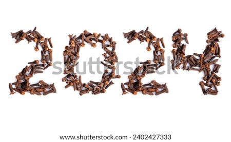 2024 New Year Written with Cloves on White Background, Happy New Year 2024 Wishing Conceptual Photo Royalty-Free Stock Photo #2402427333