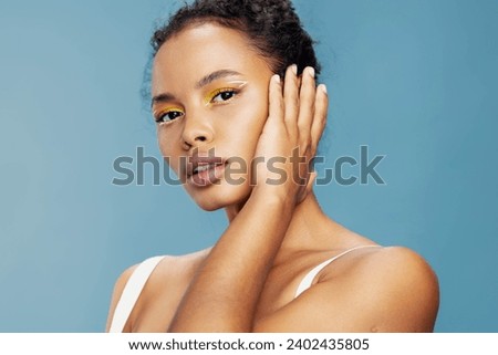 Woman beauty smile face happiness lifestyle portrait american studio make-up fashion blue skin african curly hair