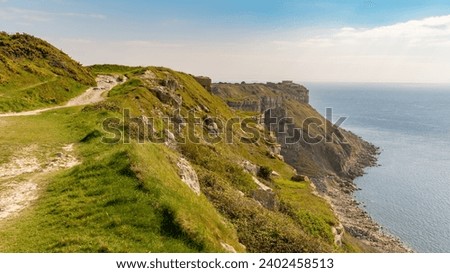 South West Coast Path at Hallelujah Bay, Isle of Portland, Jurassic Coast, Dorset, UK Royalty-Free Stock Photo #2402458513