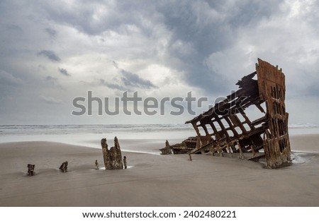 Wreck of the Peter Iredale at Fort Stevens State Park in Oregon, USA Royalty-Free Stock Photo #2402480221