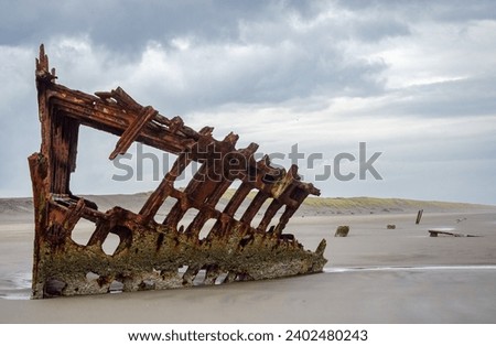 Wreck of the Peter Iredale at Fort Stevens State Park in Oregon, USA Royalty-Free Stock Photo #2402480243