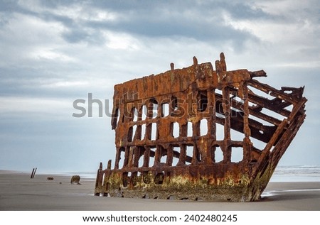 Wreck of the Peter Iredale at Fort Stevens State Park in Oregon, USA Royalty-Free Stock Photo #2402480245