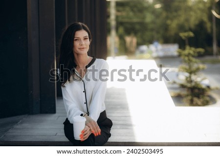 Portrait of young business woman outdoor. High quality photo