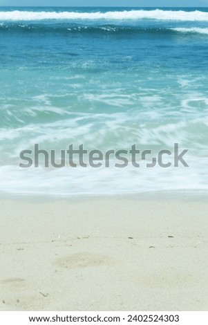 White Beach; Light Blue Ocean