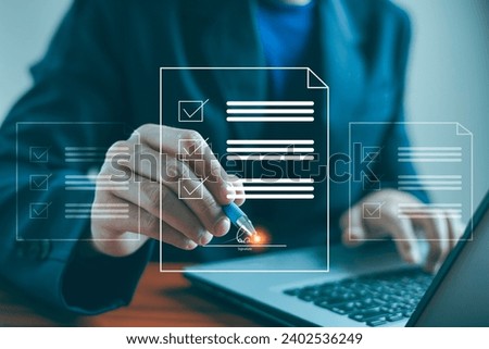 Document management or electronic signature concept, Businessman signing signature on electronic document at office, Digital signature, E-document, Technology paperless sign online on application.
